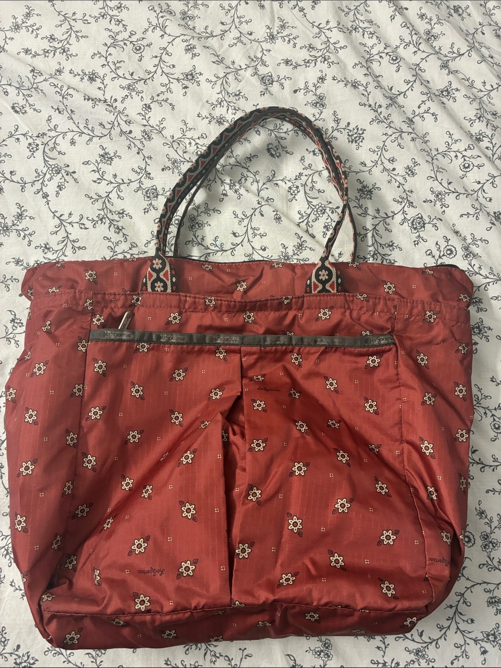 Lesportsac Red Floral Patterned Tote with Decorative Straps